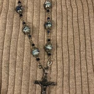 Cross necklace with blue and black beads